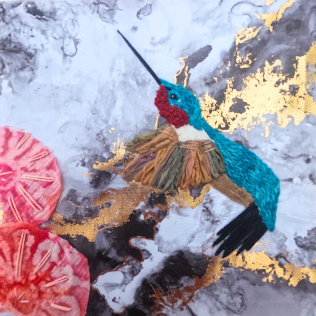 embroidered and slow stitched humming bird on recycled canvas with slow stitched flowers