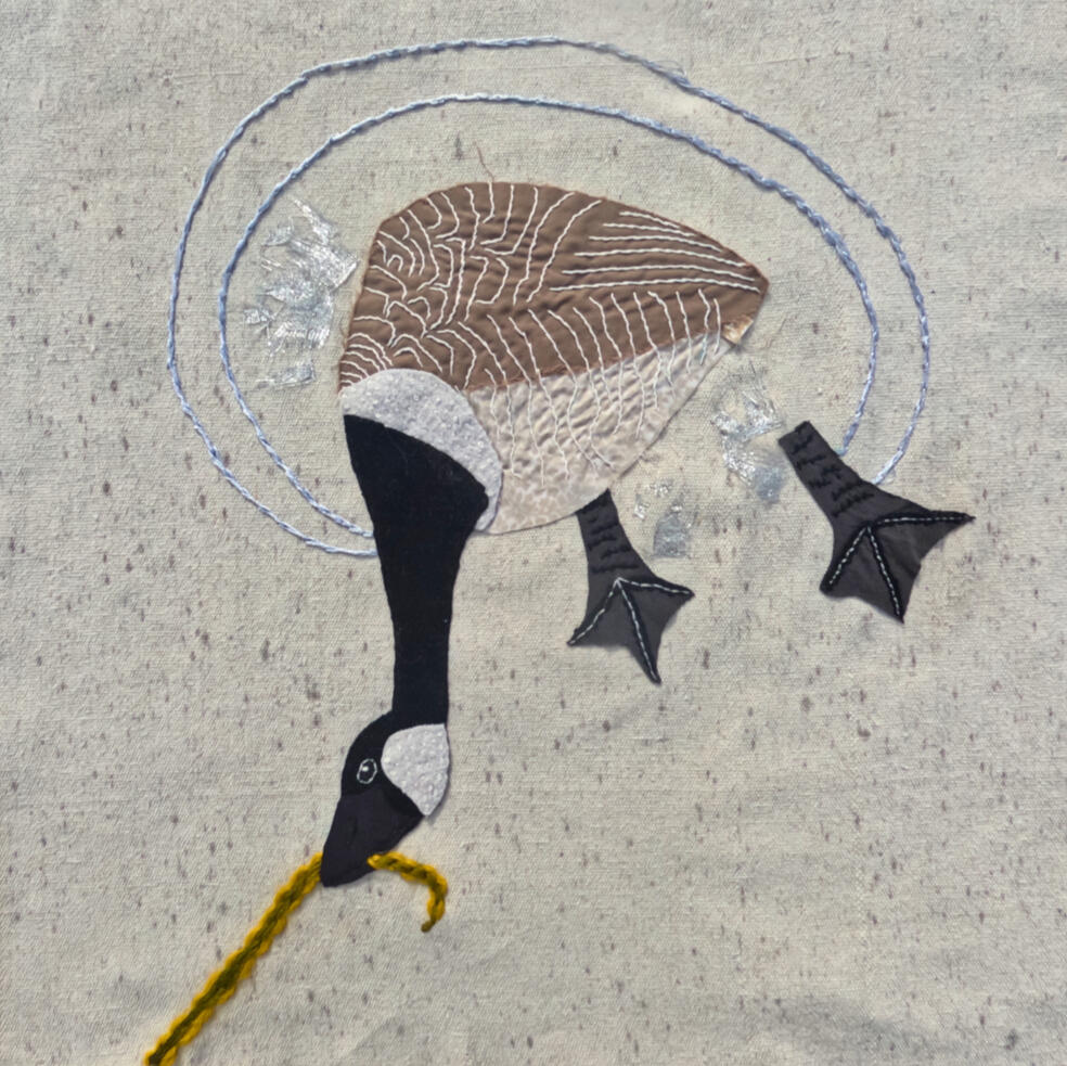 slow stitched Canada Goose on repurposed canvas