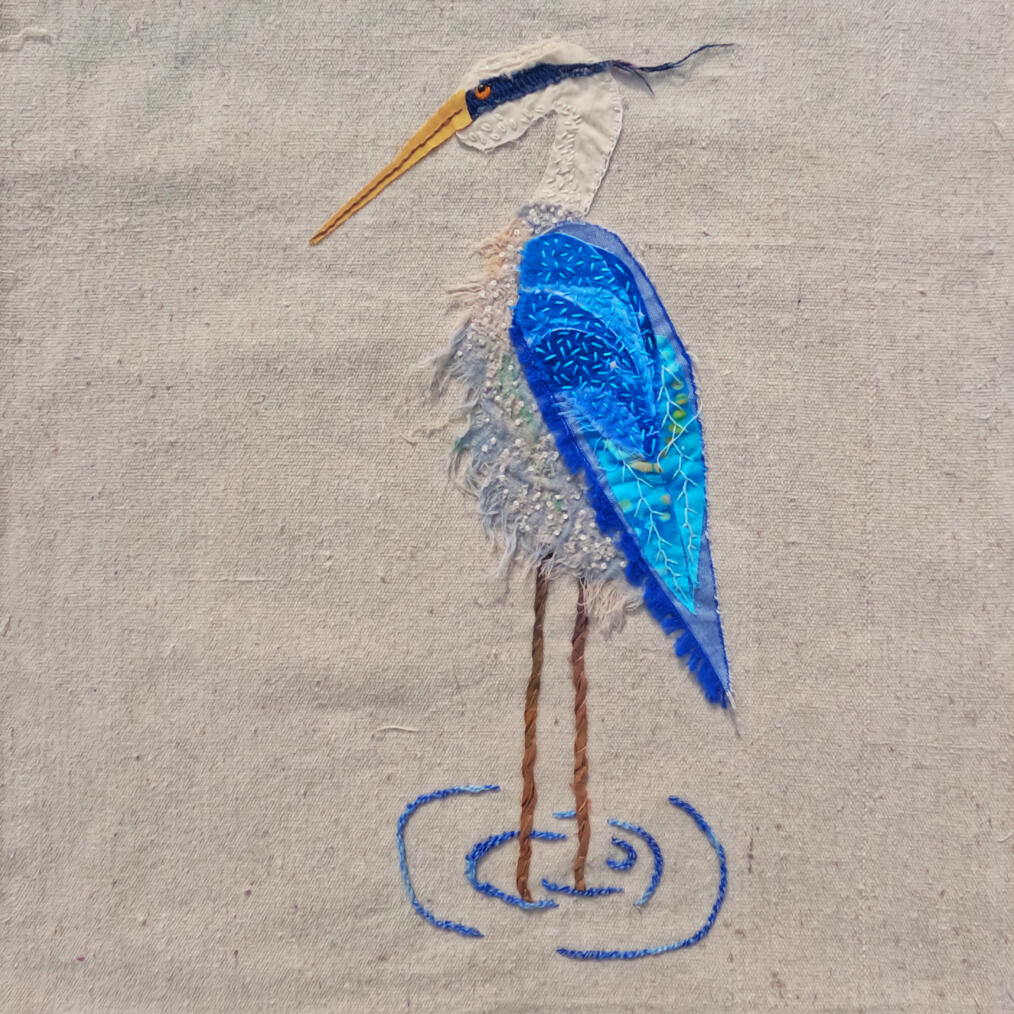 slow stitched Great Blue Heron on repurposed canvas